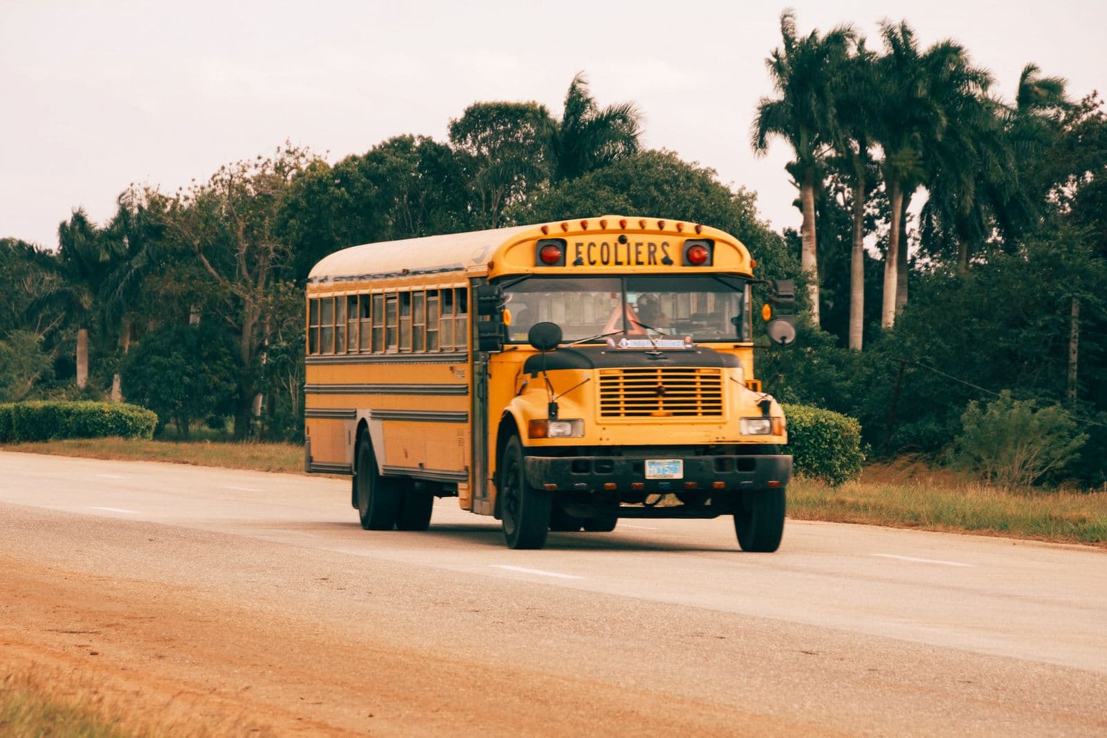 A school bus traveling on a roadway